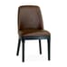 A front view of a restaurant dining chair featuring a brown vinyl seat and backrest, supported by sturdy black wooden legs