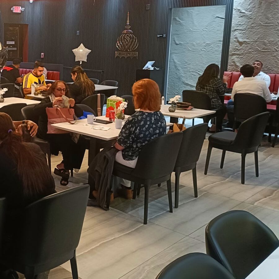 Grace QuickShip Upholstered Commercial Dining Wood Chair with Black Vinyl