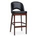 Front view of the Grace bar stool, highlighting its sleek black faux leather seat and curved backrest with an open lower back design